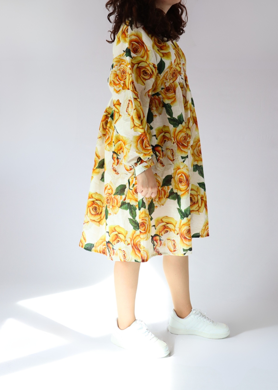 model.jpg Model wearing the oversized golden rose linen dress with empire waist and dropped shoulder line