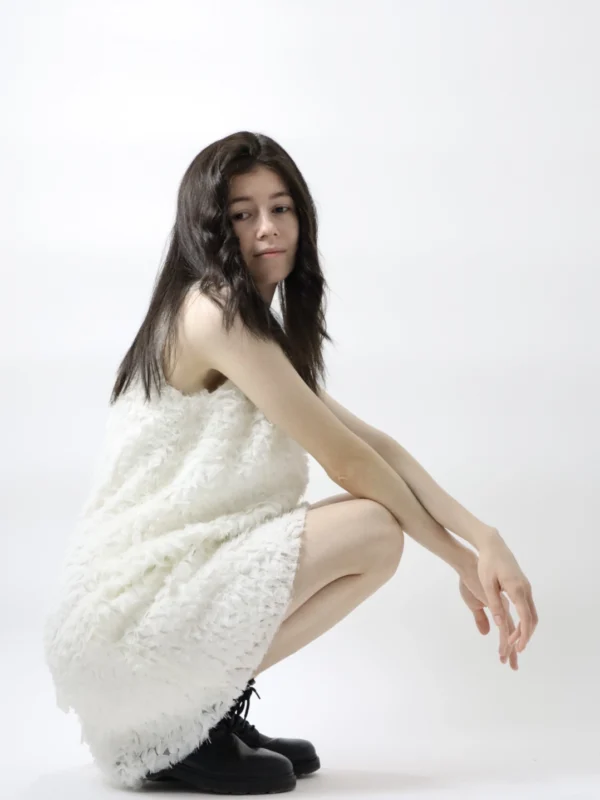 Front view of the Luna White Dress – short sleeveless white dress with Italian embroidered tulle