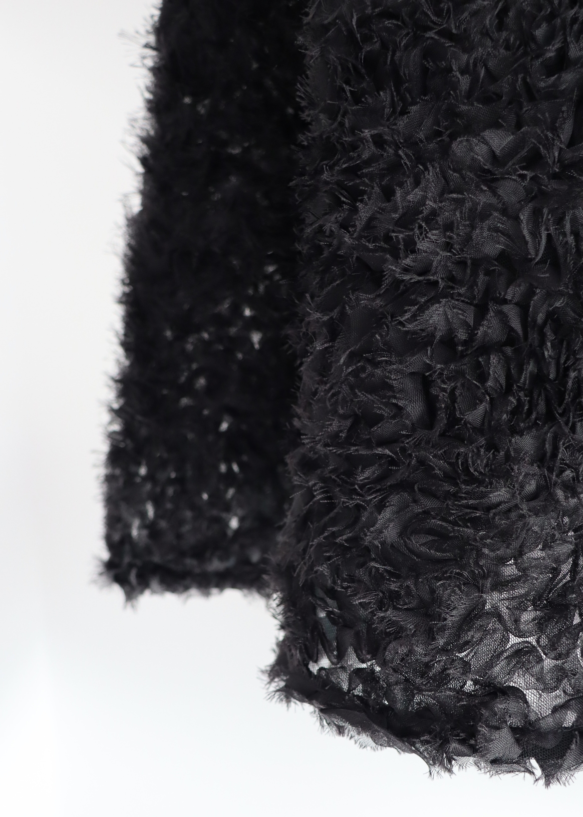 Timeless midi black dress made from embroidered tulle with semi-circular skirt and satin ribbons