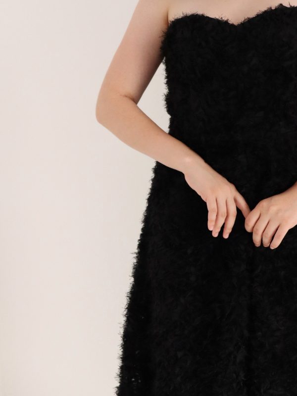 Elegant timeless midi black dress with body-shaping corset, satin ribbons, and sweetheart neckline – front view