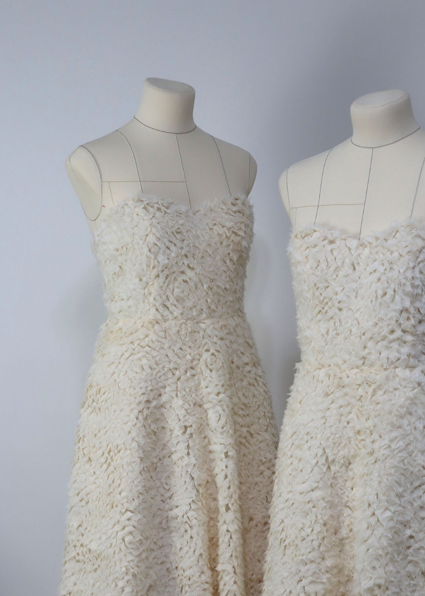 Side view of Milky White Grace Dress on mannequin
