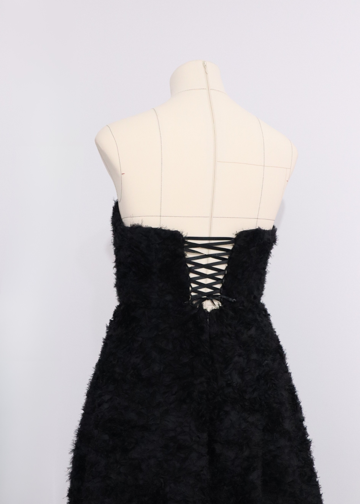 Timeless midi black dress with embroidered tulle and semi-circular skirt – back view