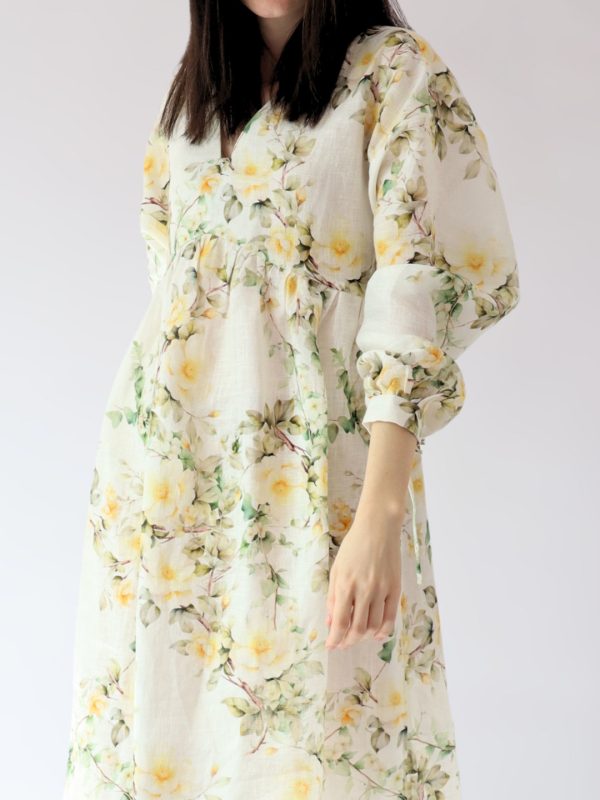 Wild rose linen dress featuring kimono style sleeves and lowered armscye