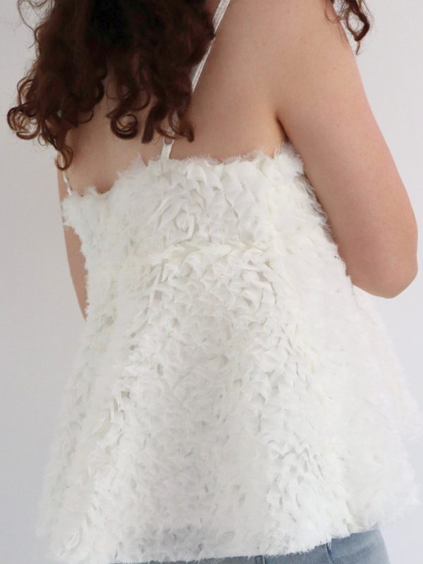 Lightweight and breezy white tulle top for casual and special occasions.